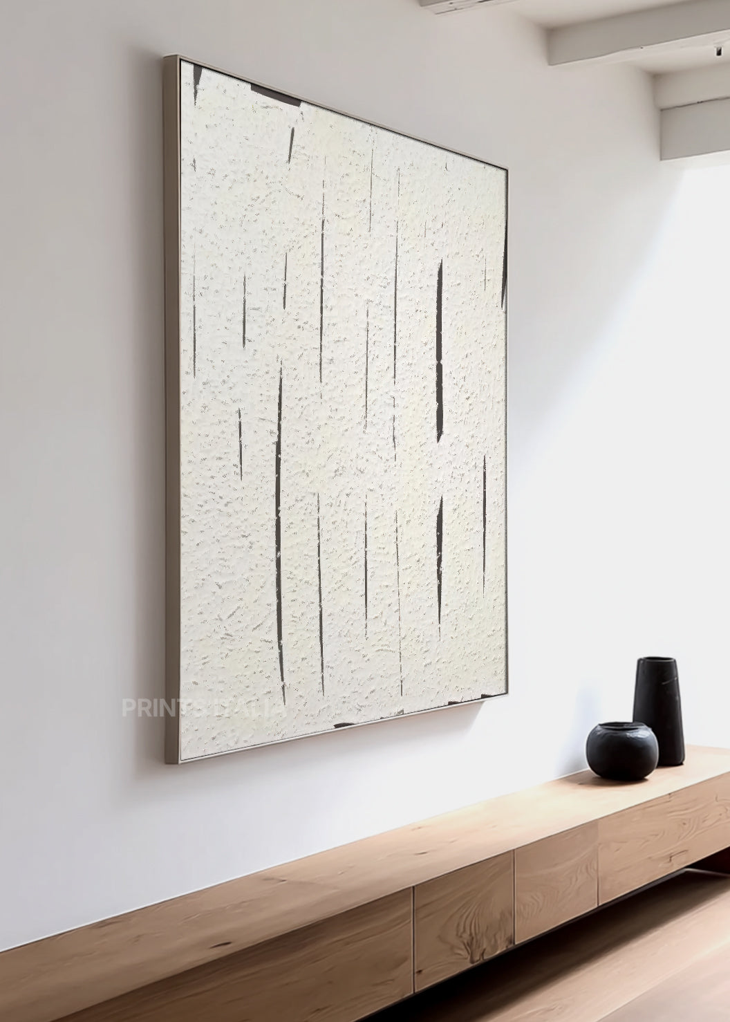 ATHERA art print featuring minimalist white composition, crisp incised lines, and subtle surface texture, leaning against a soft neutral wall