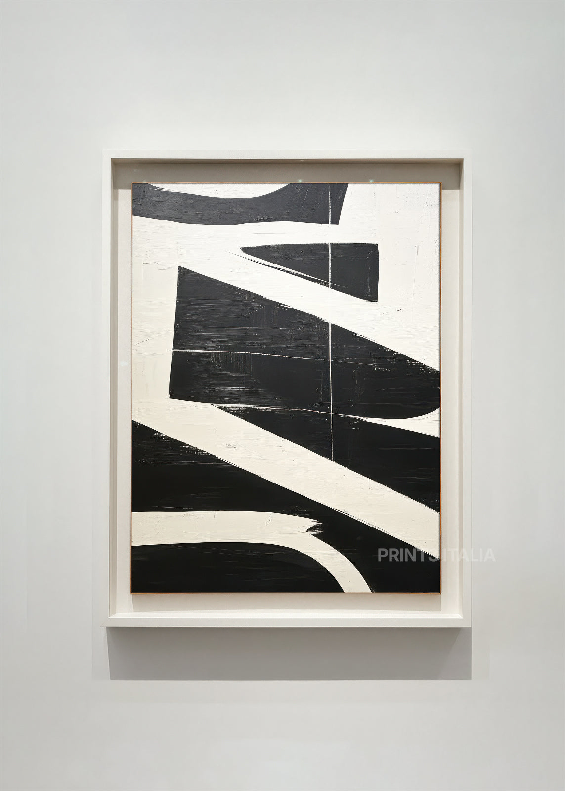 AUNIRA abstract art print framed – bold black geometric forms and diagonal lines on an ivory background