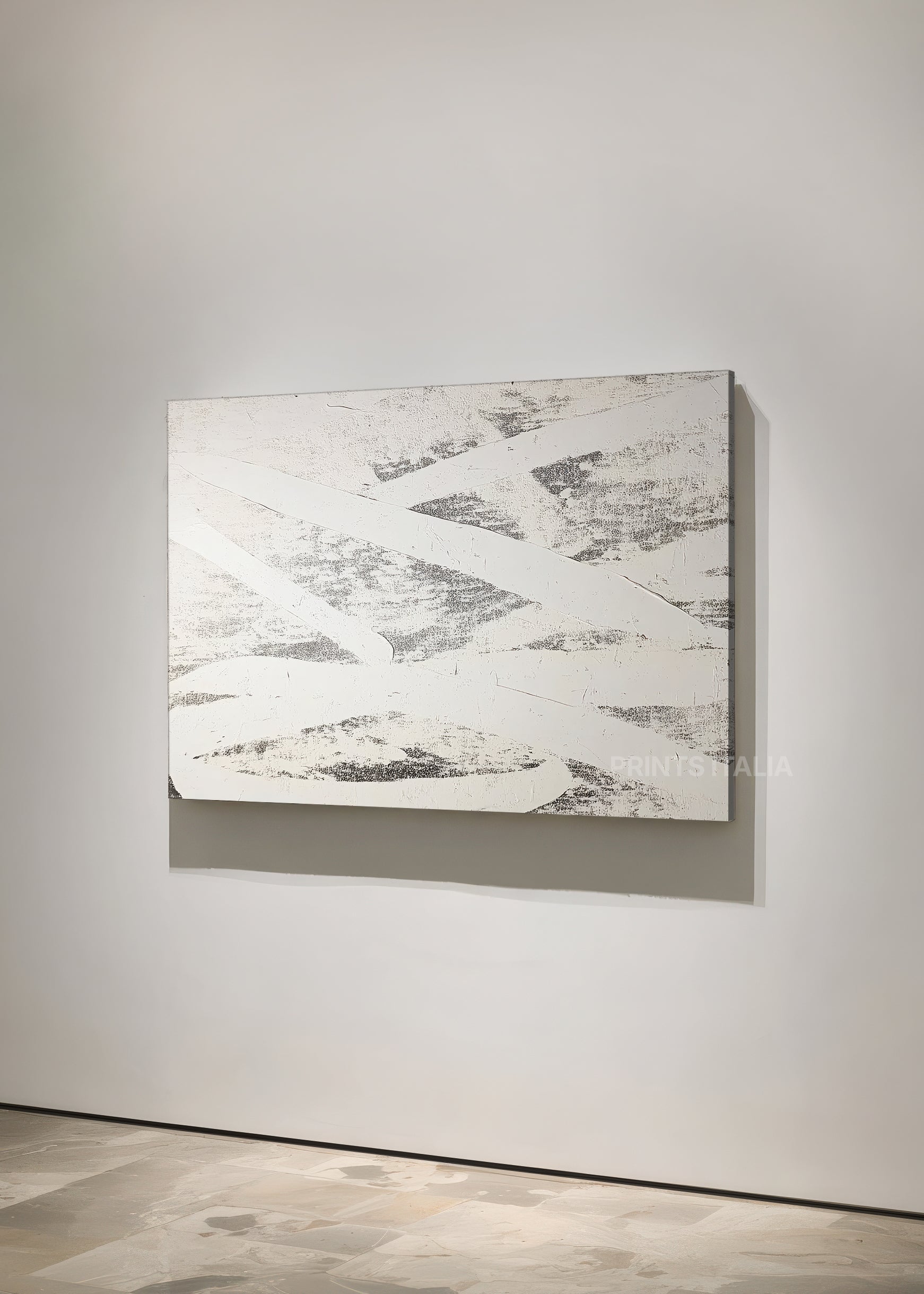 Unframed CALIVOR art print featuring minimalist slate and white composition, dynamic arcs, and gentle surface texture, leaning against a soft neutral wall