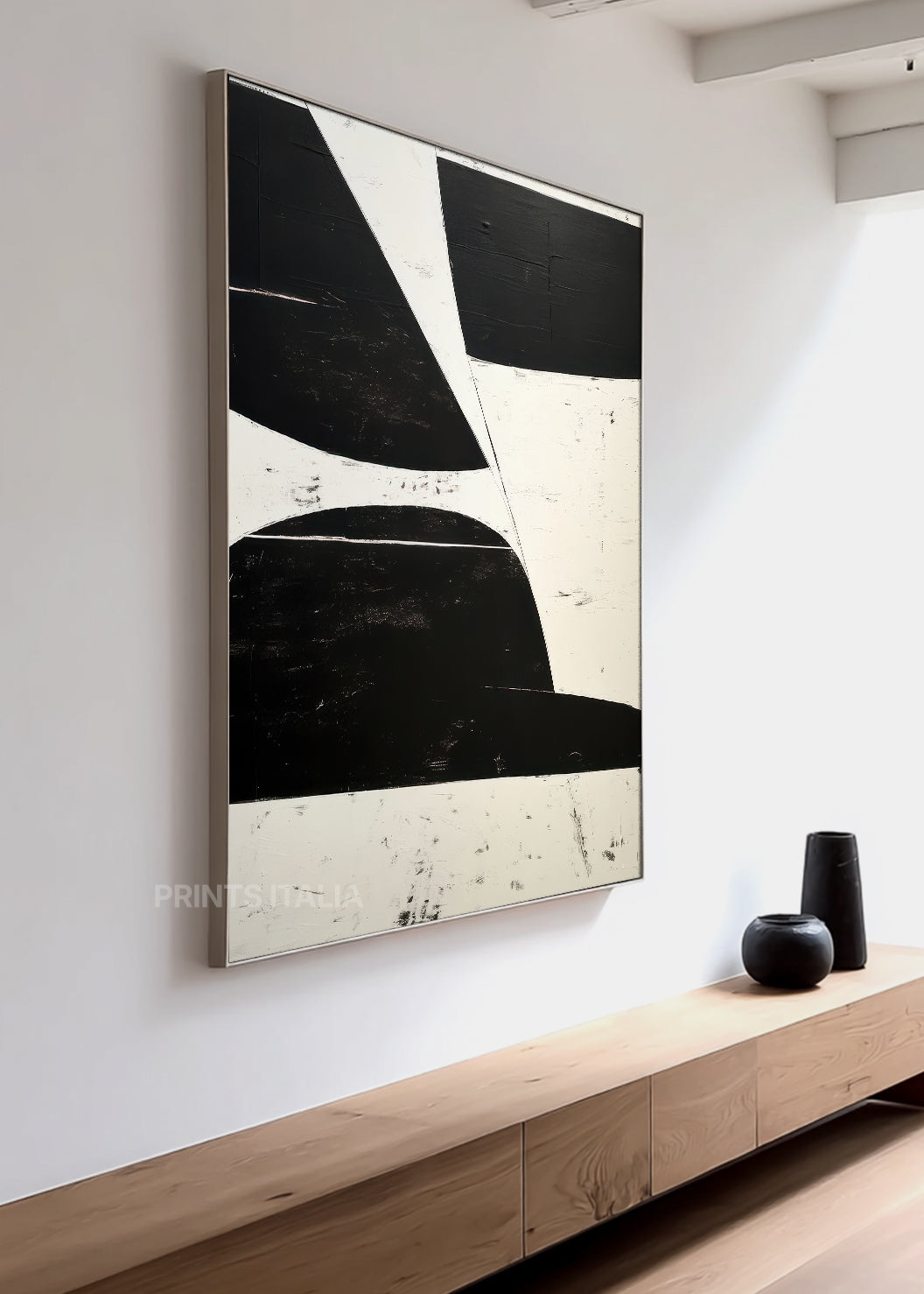 Close-up of DRUELITH print showing tactile surface texture, sharp edges between black and white shapes, and subtle distressed marks