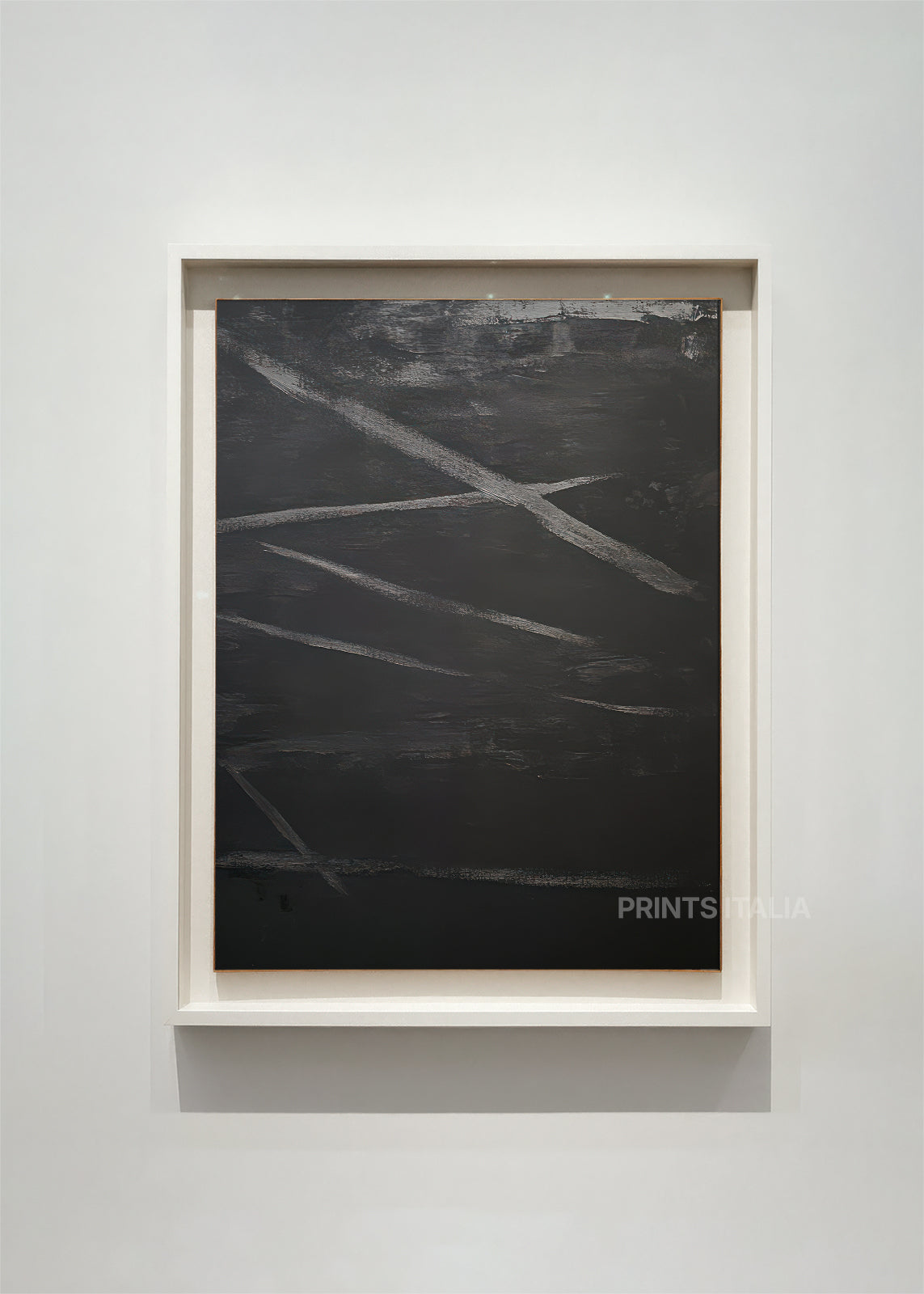 ELVETH – framed minimalist abstract art print with deep charcoal field and sweeping silver-gray lines, displayed in a modern gallery setting
