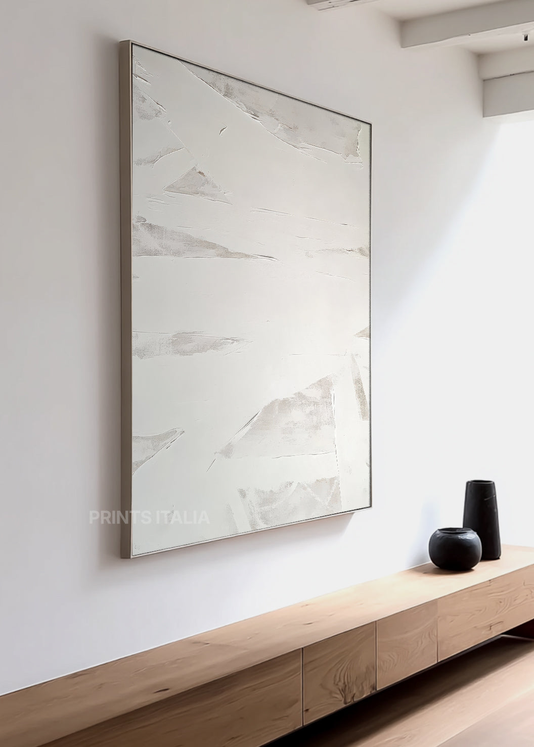 Close-up of IQUOR print showing layered white and neutral textures, dynamic black gestures, and subtle surface detail