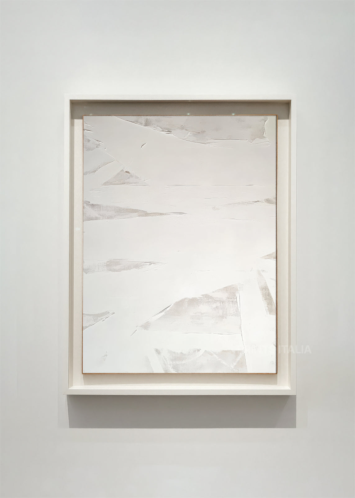 IQUOR – framed minimalist abstract art print with crisp white fields, neutral layers, and bold black marks, displayed in a modern gallery setting