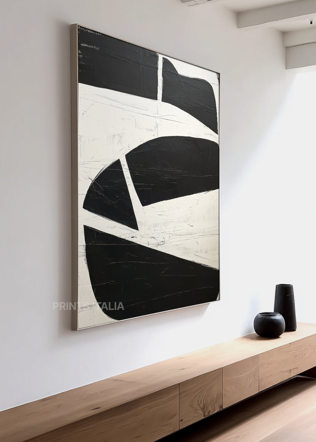 Close-up of ISVIAN print showing layered black paint, sharp white lines, and tactile surface texture