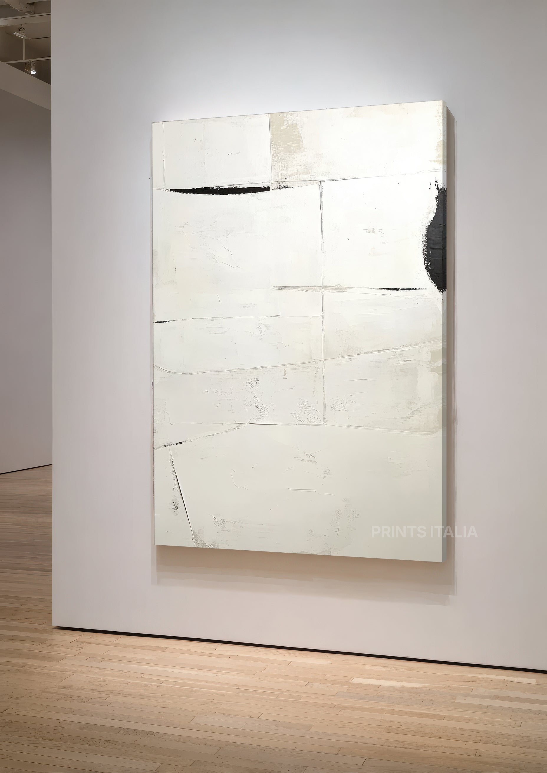 Close-up of IYLA print showing luminous white surface, fine textural details, and gentle shadow play across the artwork