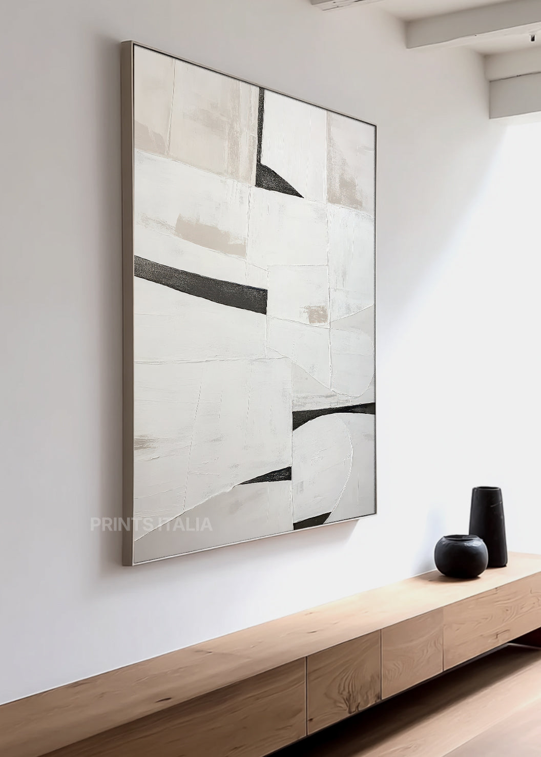 LORVEN print displayed in a contemporary gallery, highlighting its geometric white and grey layers and sharp black contrasts