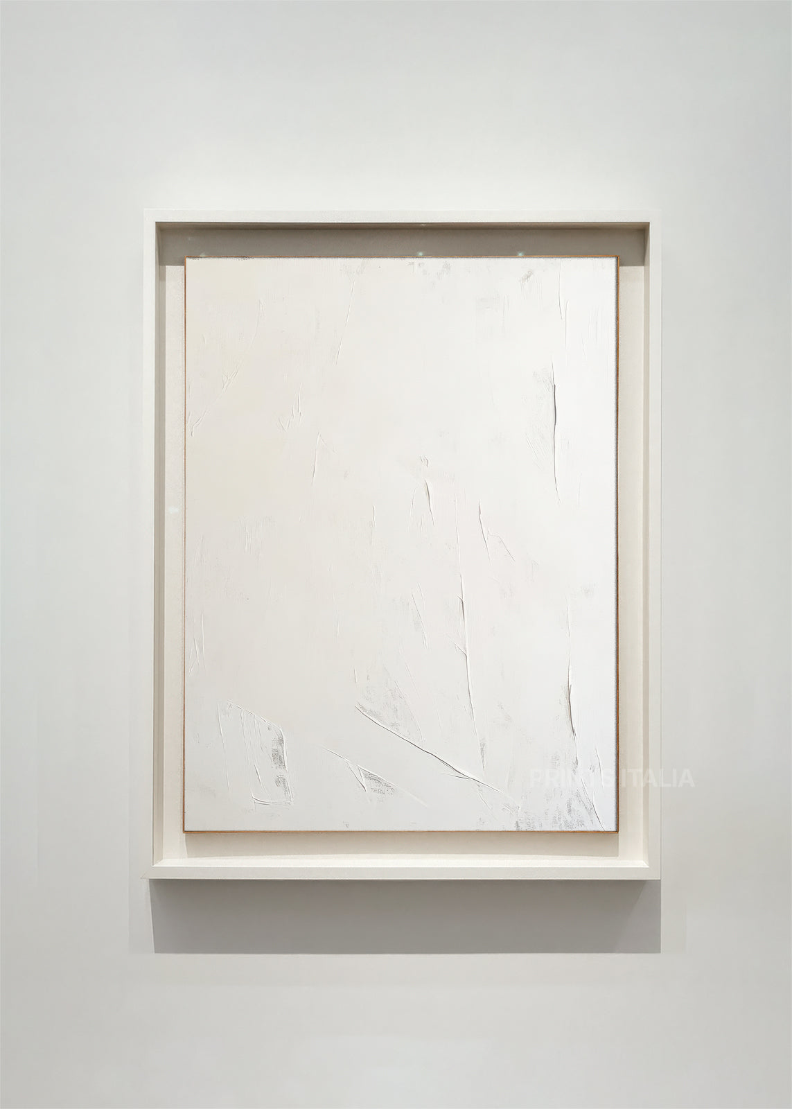 NERITH – framed minimalist abstract art print with pure white surface, subtle marks, and gentle texture, displayed in a bright modern gallery
