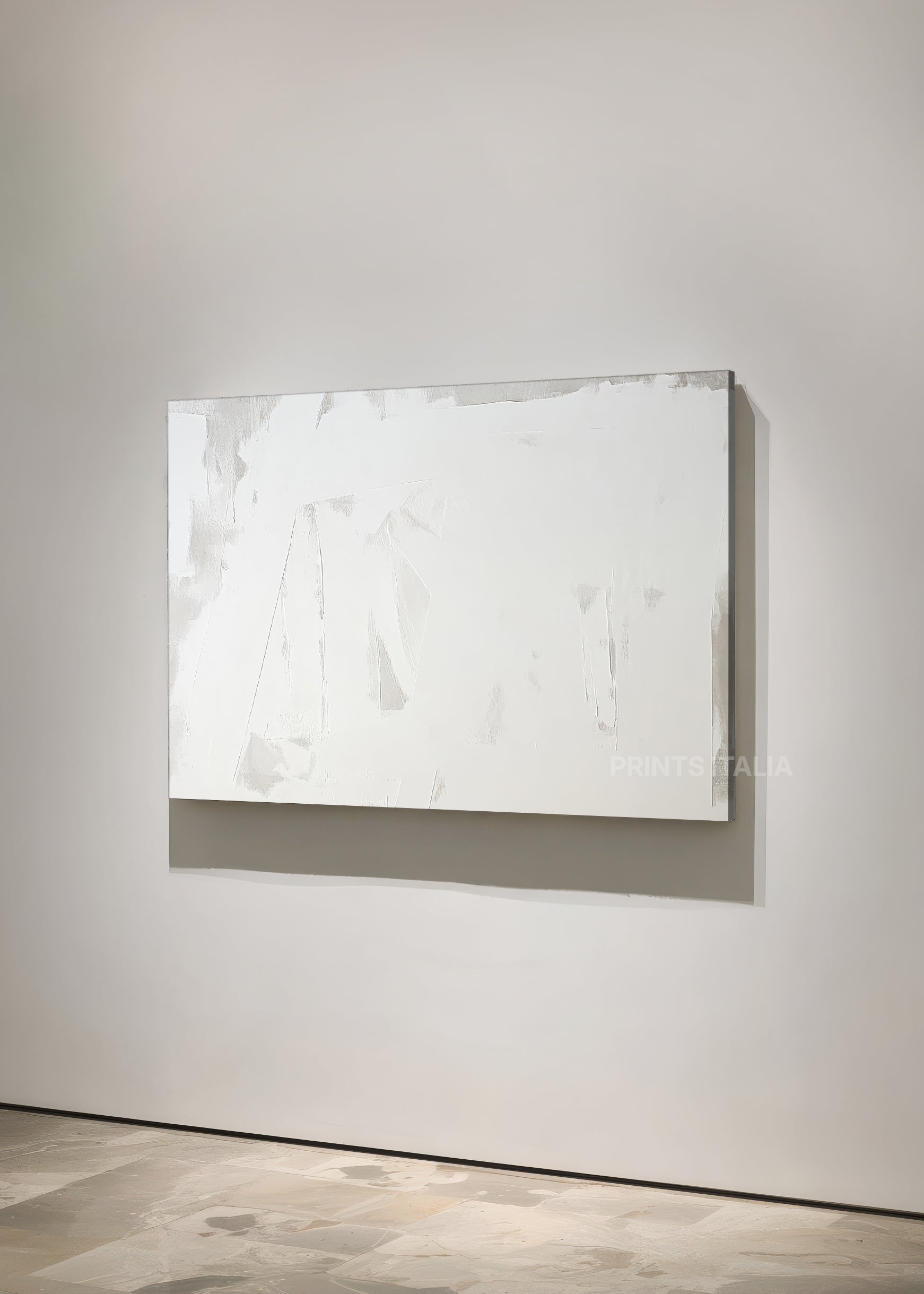 NIVARA art print featuring pure white minimalism, soft surface texture, and subtle tonal layers, leaning against a soft neutral wall