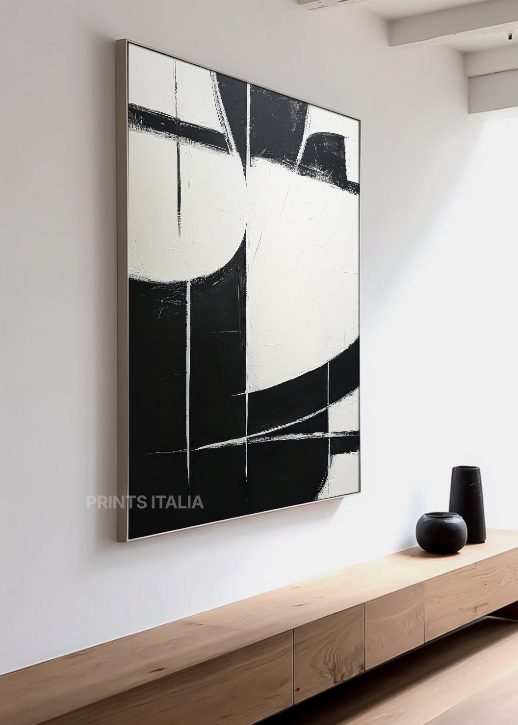 Close-up of NOELIS print showing tactile black and white surface, graphic edges, and intersecting linear accents