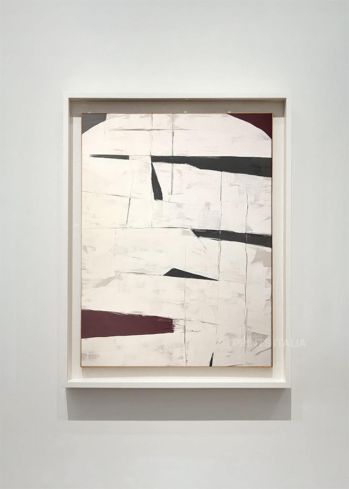 NUVIRA abstract art print framed – bold black planes and maroon accent on textured ivory background