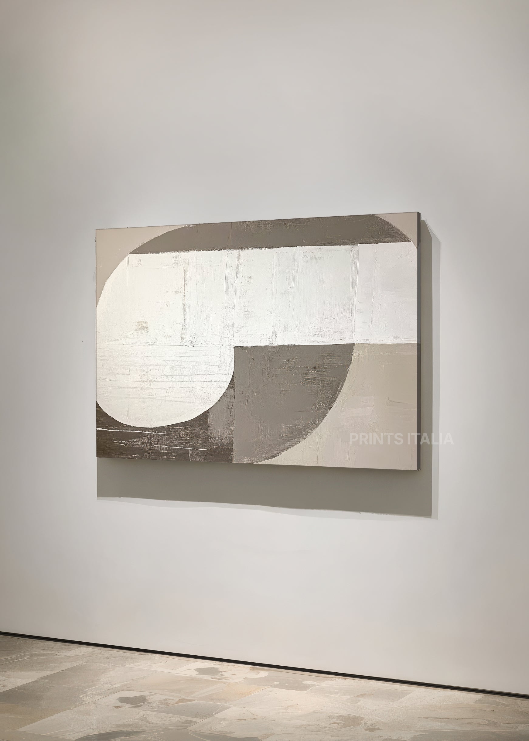 Unframed NYMA art print featuring minimalist taupe and white composition, bold curves, and gentle surface texture, leaning against a soft neutral wall
