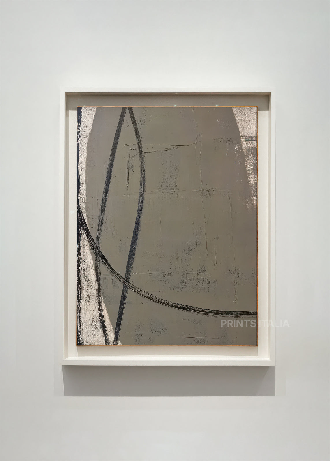 Framed ORVIA print with deep taupe texture and sweeping charcoal linework on neutral wall