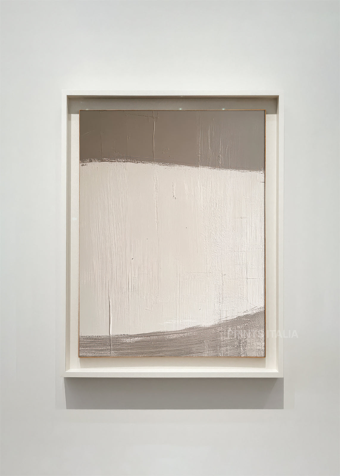 RUNYA – framed minimalist abstract art print with warm taupe and cream fields, gentle tonal transitions, and subtle vertical striations, displayed in a modern gallery setting