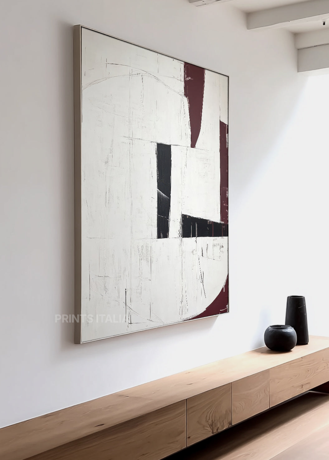 SAPHIS art print featuring minimalist white, black, and merlot composition, structured geometry, and layered textures, leaning against a soft neutral wall
