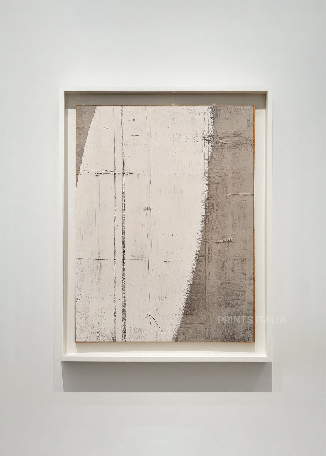 The Solin abstract art print shown vertically in a white frame, featuring a textured arc against a warm grey background.