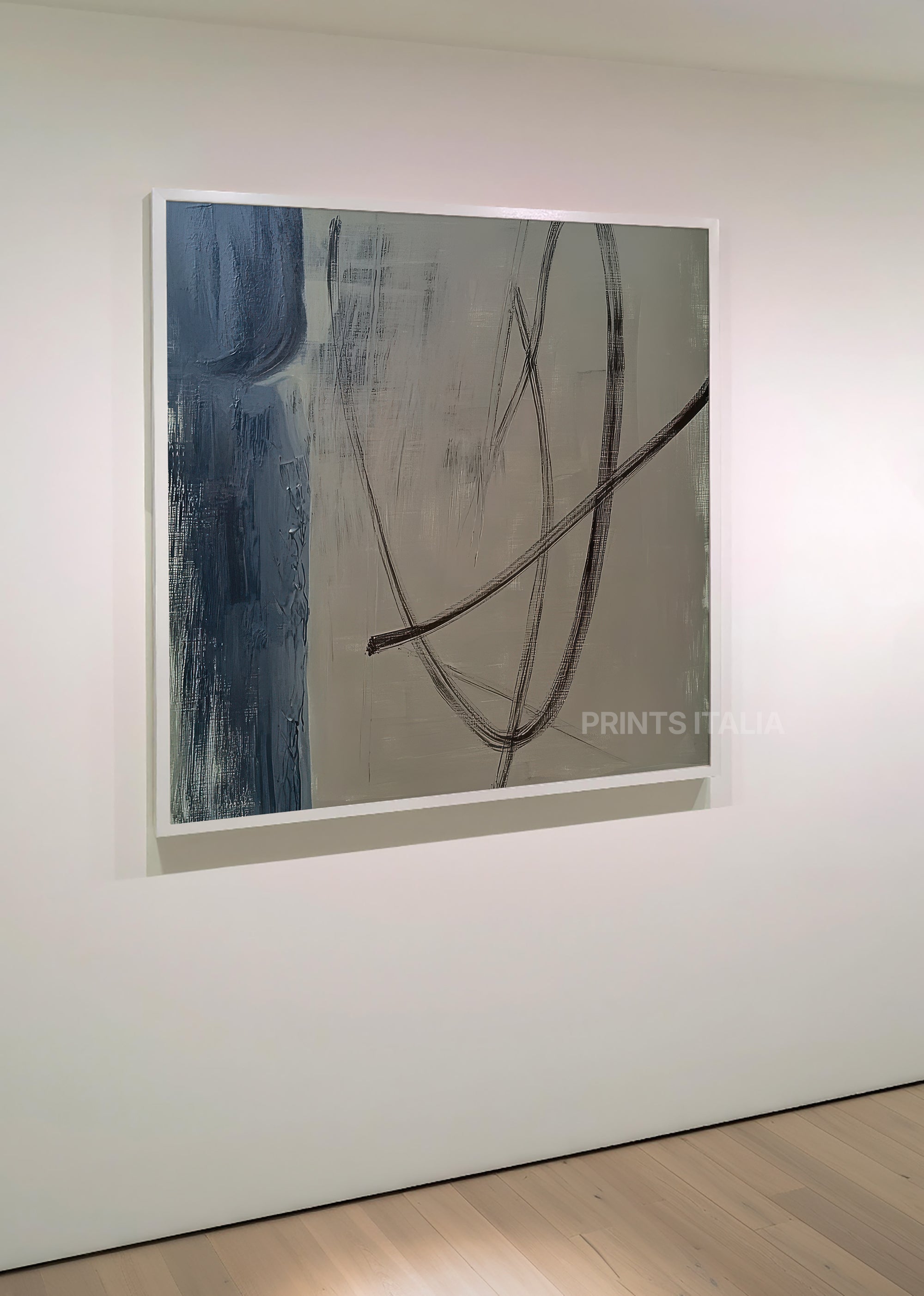 SOLVANI print displayed in a minimalist gallery, highlighting its blue and grey palette and dynamic charcoal arcs