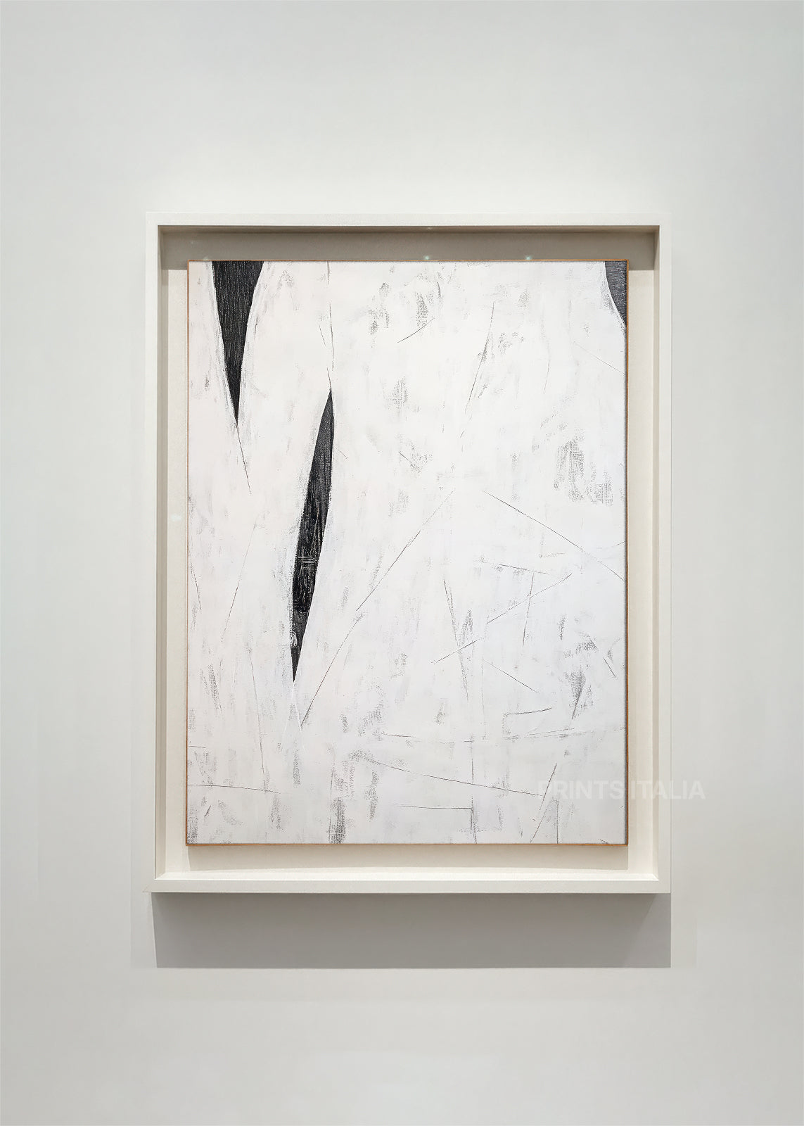 TESSARI abstract art print framed – striking black diagonal shapes on a layered white background