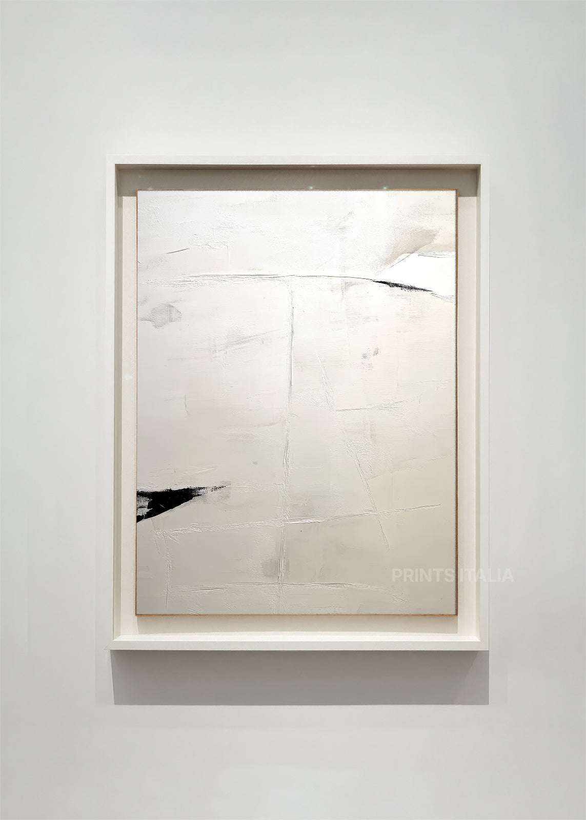 Framed YUNA abstract art print with layered whites and expressive black brushstroke on gallery wall