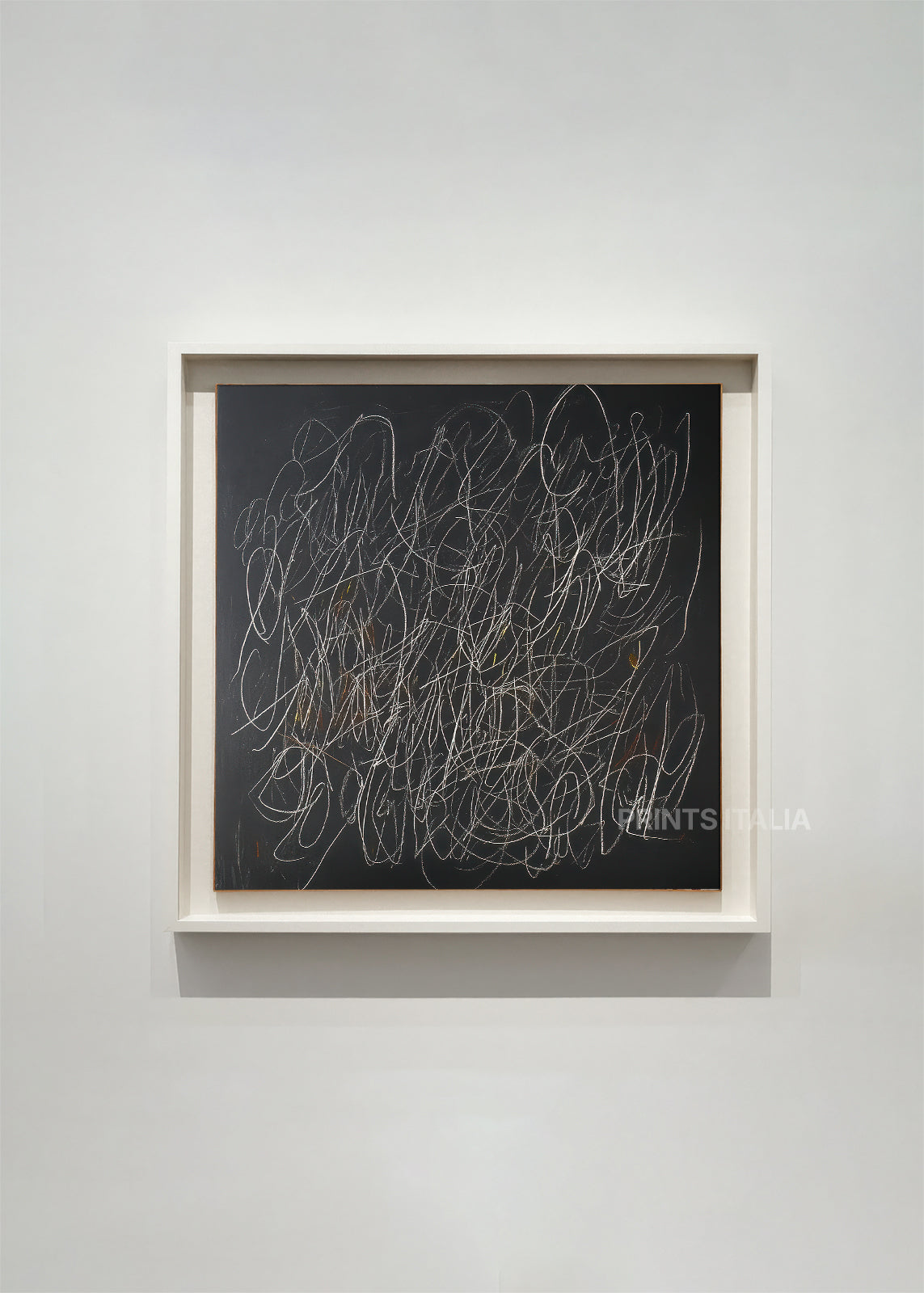 Framed ZAVINE artwork featuring abstract scribbled lines in light tones on deep matte black background
